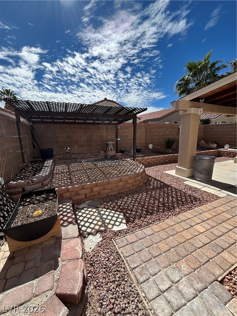 2661 Hillgrass Road Las Vegas, NV 89123 - Photo 24 of 27 Fenced backyard with a patio