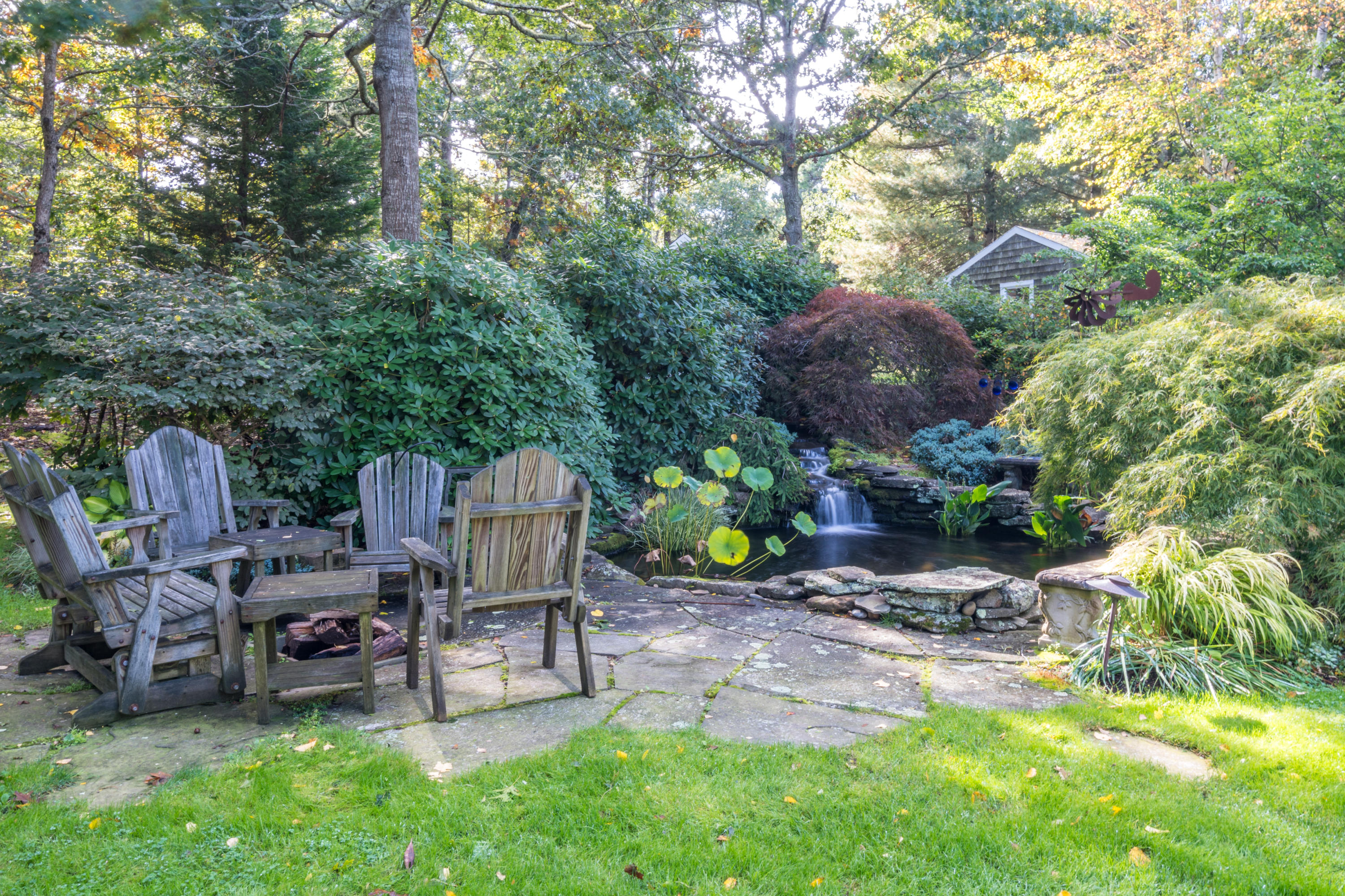 248 Long Pond Road Brewster, MA 02631 - Photo 11 of 45 Firepit & Koi Pond