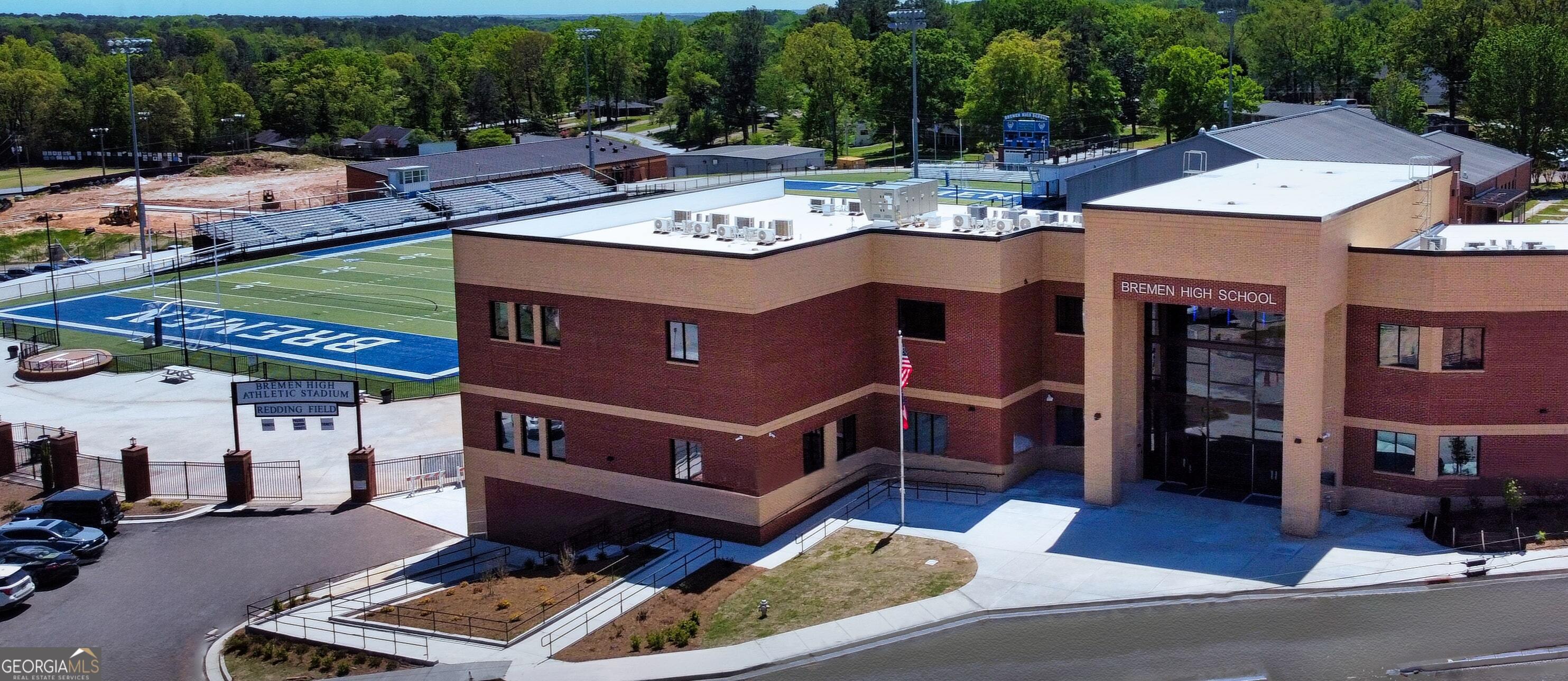 805 Laurel Street Bremen, GA 30110 - Photo 11 of 33 a view of a patio with table and chairs and a barbeque