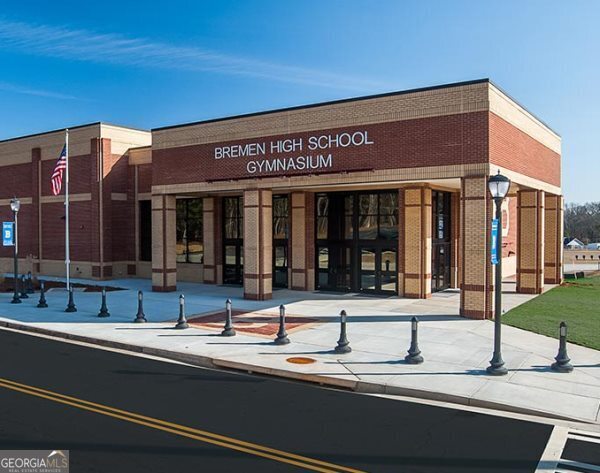 805 Laurel Street Bremen, GA 30110 - Photo 12 of 33 a front view of a building with small shops