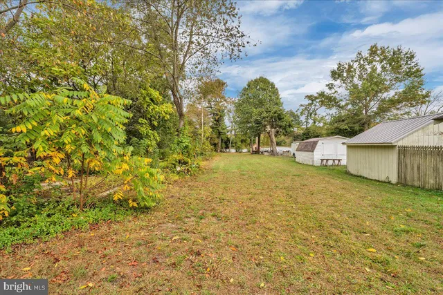 a view of a yard with an outdoor space