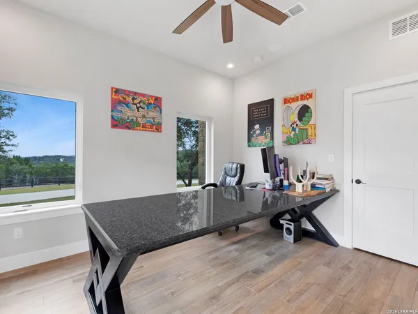 a living room with furniture and a view