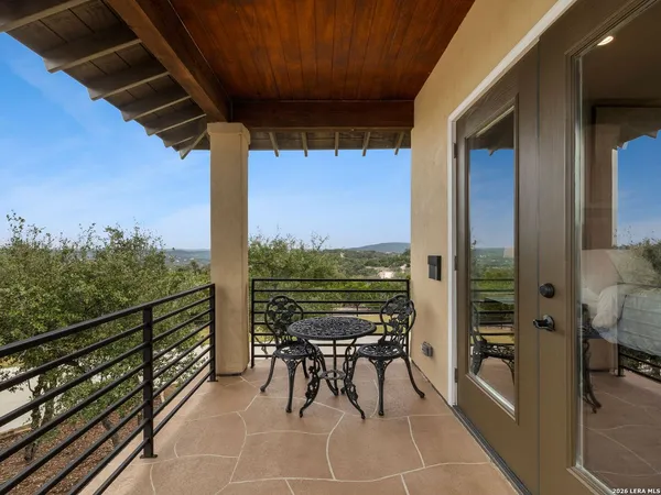 a bedroom with a bed and a view of bathroom