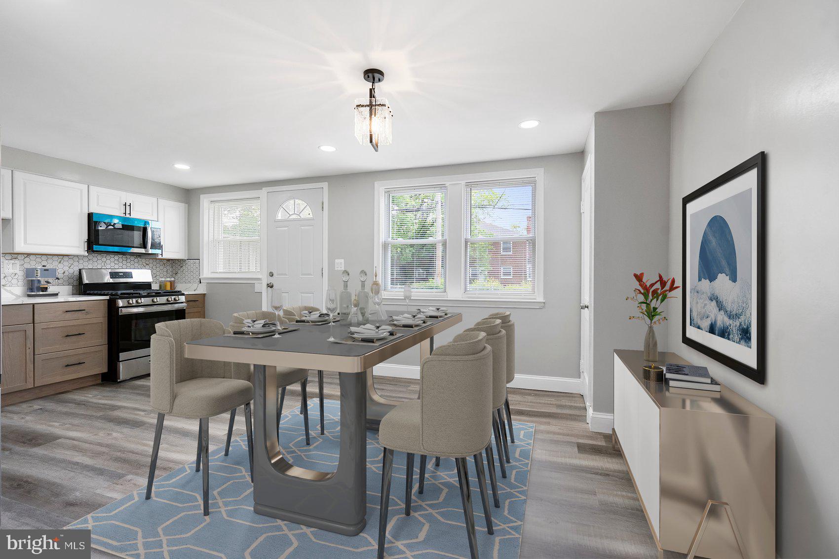 1601 Burnwood Road Baltimore, MD 21239 - Photo 3 of 46 a view of a dining room with furniture window and wooden floor