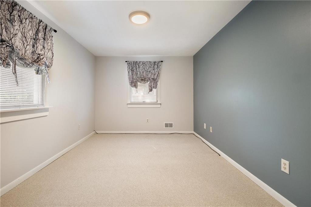 522 Upper Road Pittsburgh, PA 15228 - Photo 22 of 45 an empty room with windows