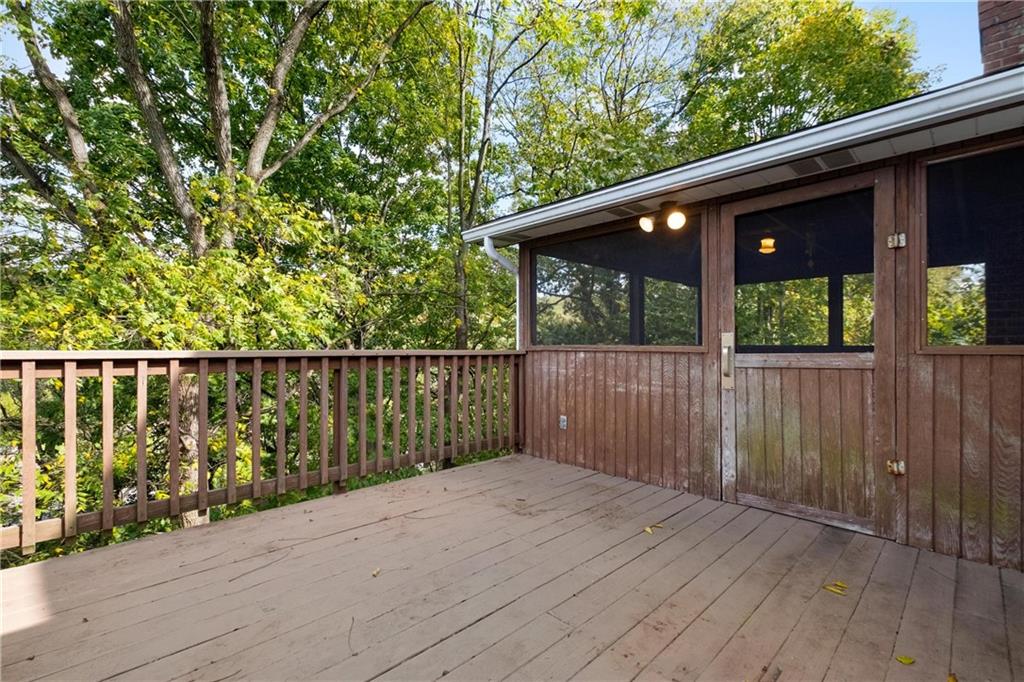 522 Upper Road Pittsburgh, PA 15228 - Photo 31 of 45 a balcony with wooden floor