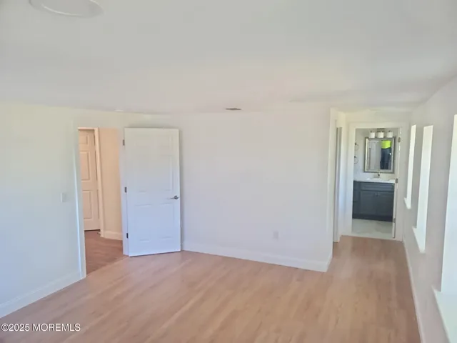 a view of a livingroom from a hallway