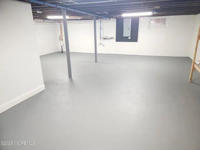 a view of a balcony with a barbeque