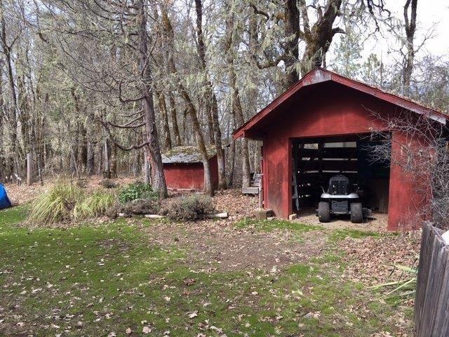 7900 Takilma Road Cave Junction, OR 97523 - Photo 12 of 22 Equip shed 10x11 Chicken coop in of rear