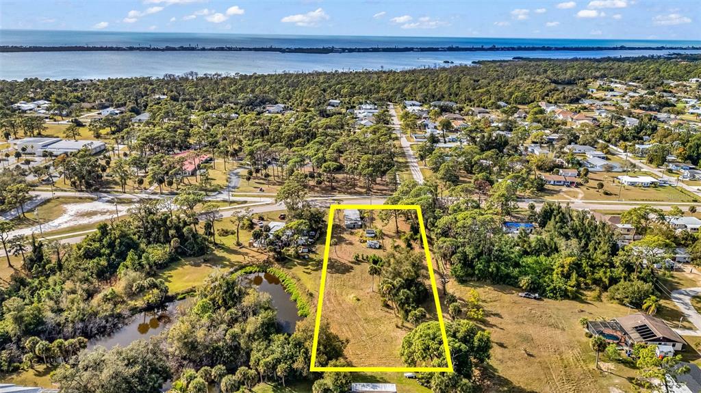 787 Old Englewood Road Englewood, FL 34223 - Photo 5 of 6 a view of a street with an ocean view