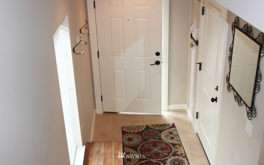 5020 Delridge Way Southwest, Unit A Seattle, WA 98106 - Photo 2 of 22 a bathroom with a bathtub and a shower
