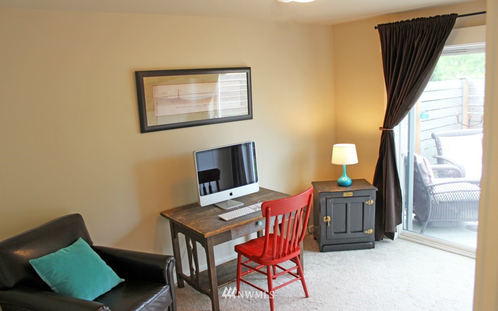 5020 Delridge Way Southwest, Unit A Seattle, WA 98106 - Photo 18 of 22 a workspace room with furniture and a window