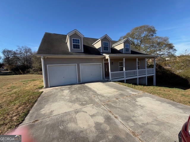 a front view of a house with large windows