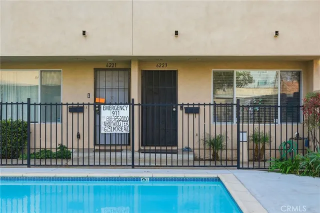 a view of a house with a small yard
