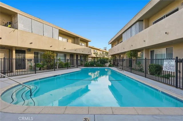 a view of swimming pool with patio