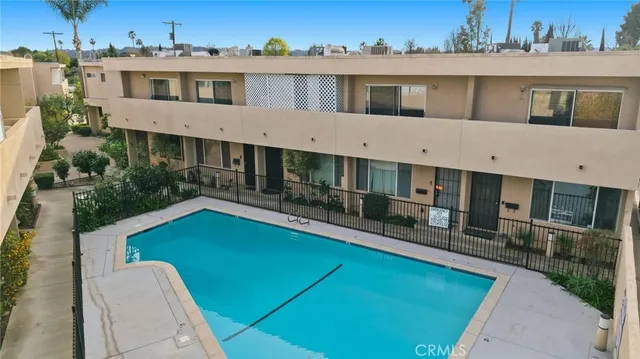 a aerial view of a house with a swimming pool