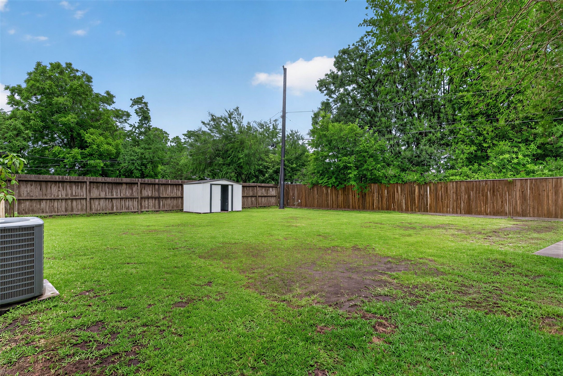 13919 Santa Teresa Road Houston, TX 77045 - Photo 21 of 22 Backyard has been digitally cleared to convey work space