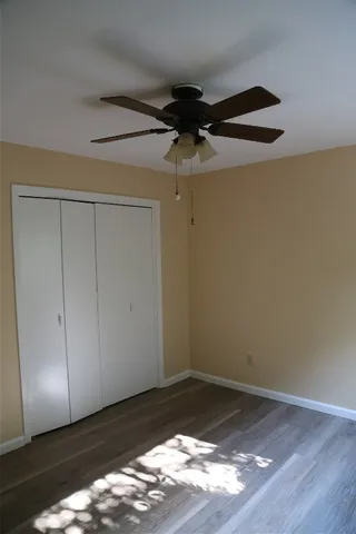 a view of a small space with wooden floor