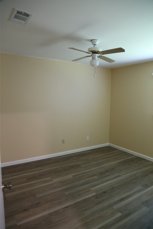 Undisclosed Address Austin, TX 78727 - Photo 15 of 36 a view of an empty room with wooden floor and fan