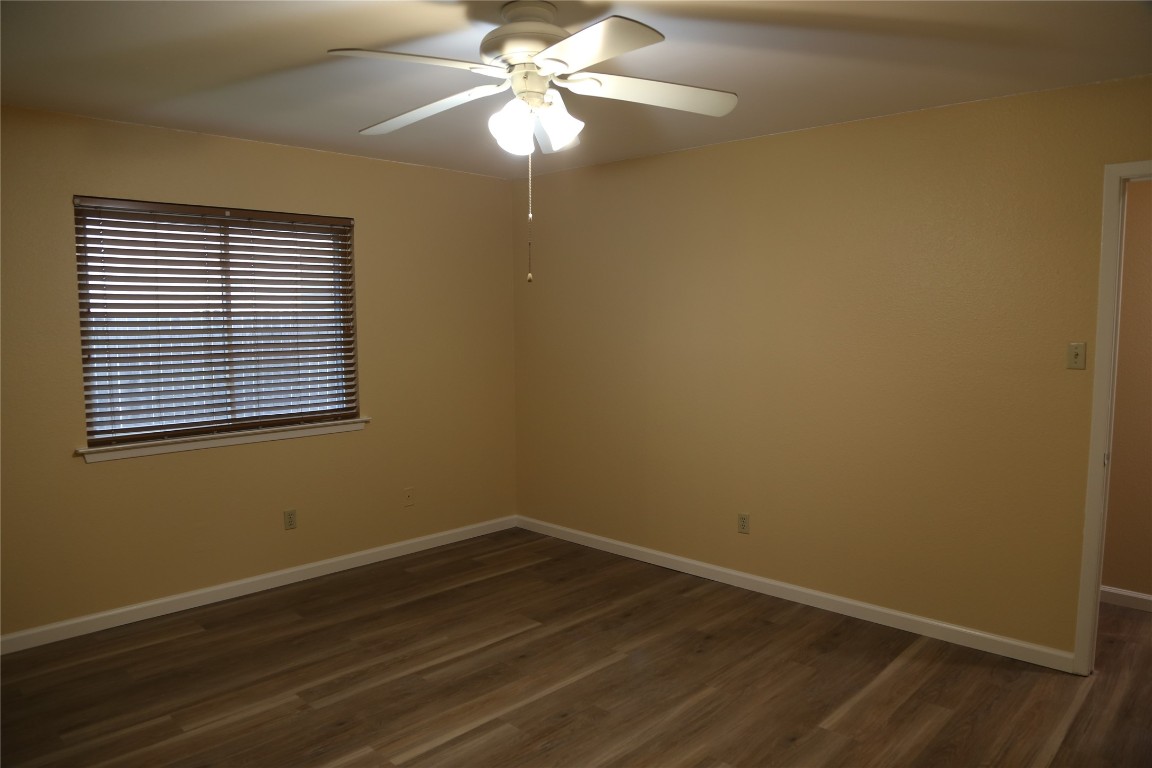 Undisclosed Address Austin, TX 78727 - Photo 17 of 36 a view of a room with wooden floor and a window