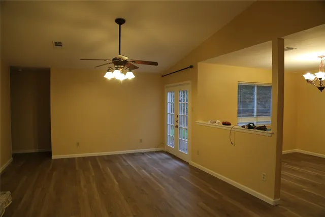 a very nice looking room with wooden floor