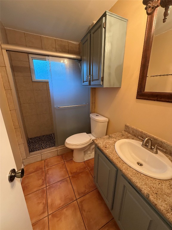 Undisclosed Address Austin, TX 78727 - Photo 33 of 36 a bathroom with a sink a toilet and mirror