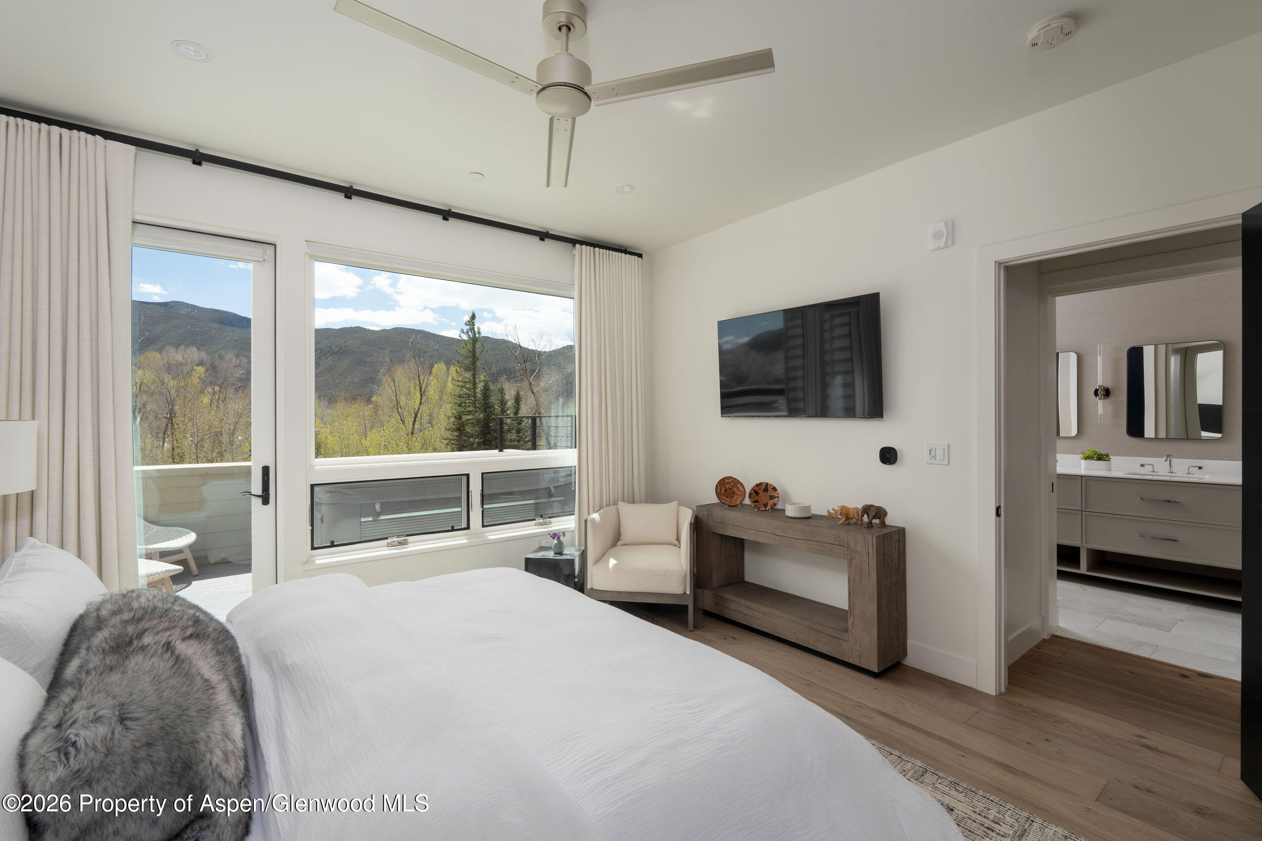 22856 Two Rivers Road Basalt, CO 81621 - Photo 17 of 40 Primary bedroom with deck and ensuite