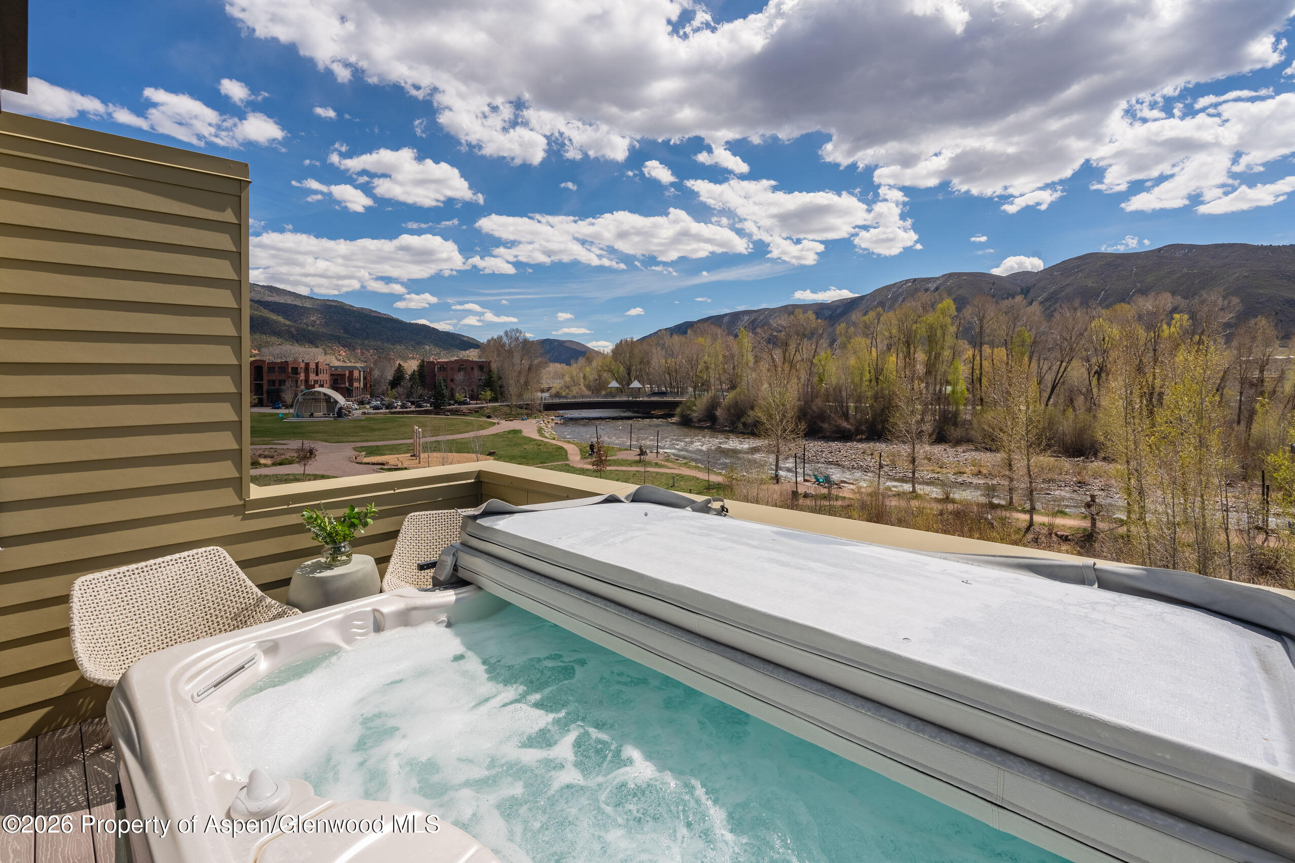 22856 Two Rivers Road Basalt, CO 81621 - Photo 19 of 40 Primary bedroom deck with hot tub
