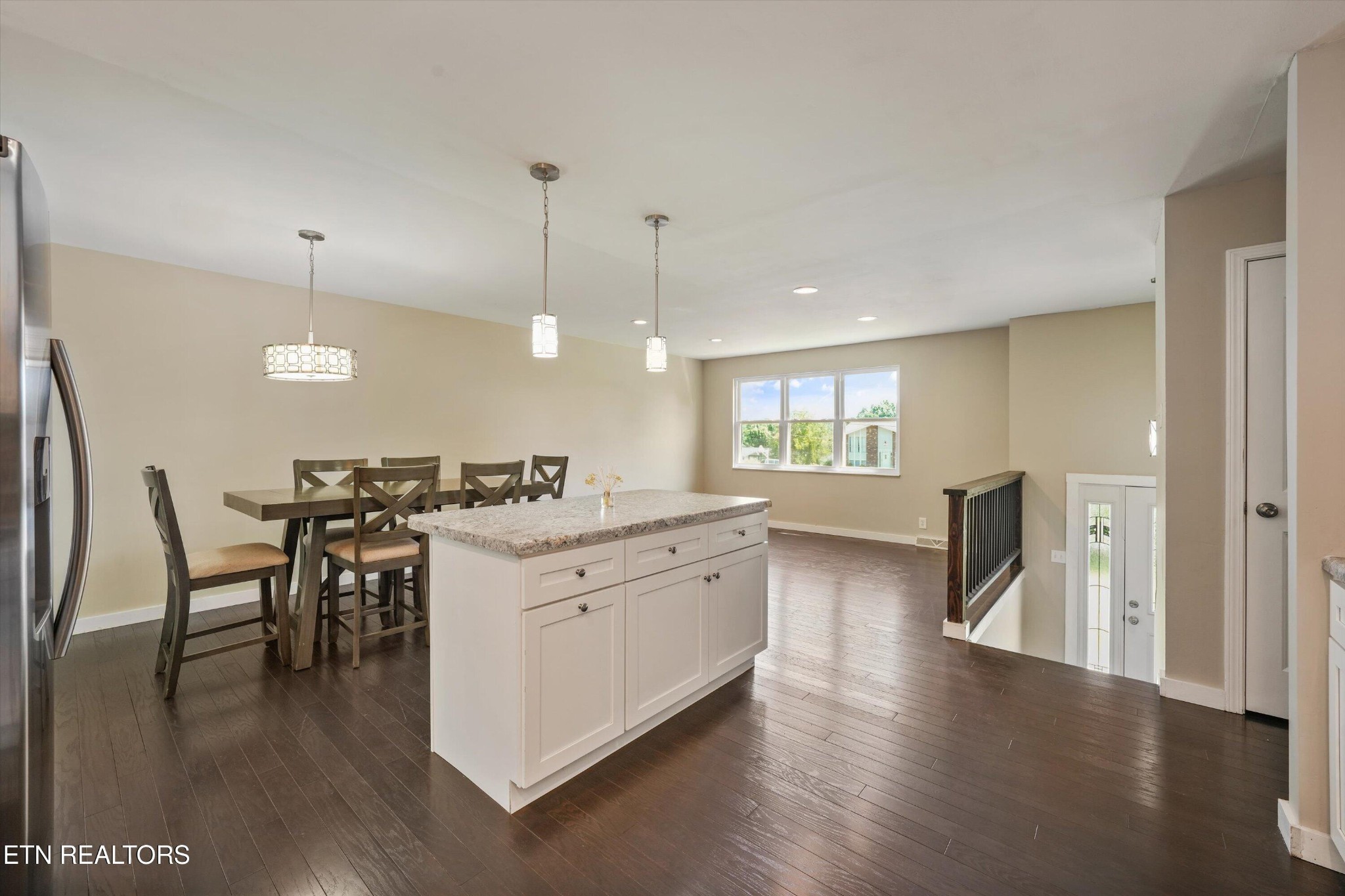 7613 Fall Wind Court Powell, TN 37849 - Photo 8 of 38 a large white kitchen with lots of counter space a sink and appliances