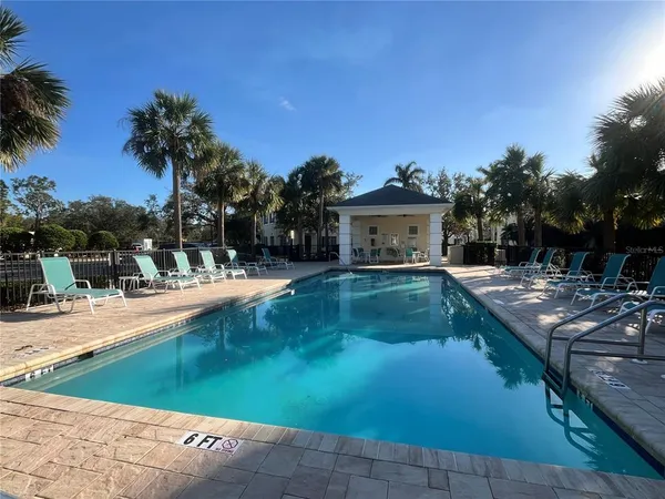 a view of a house with swimming pool