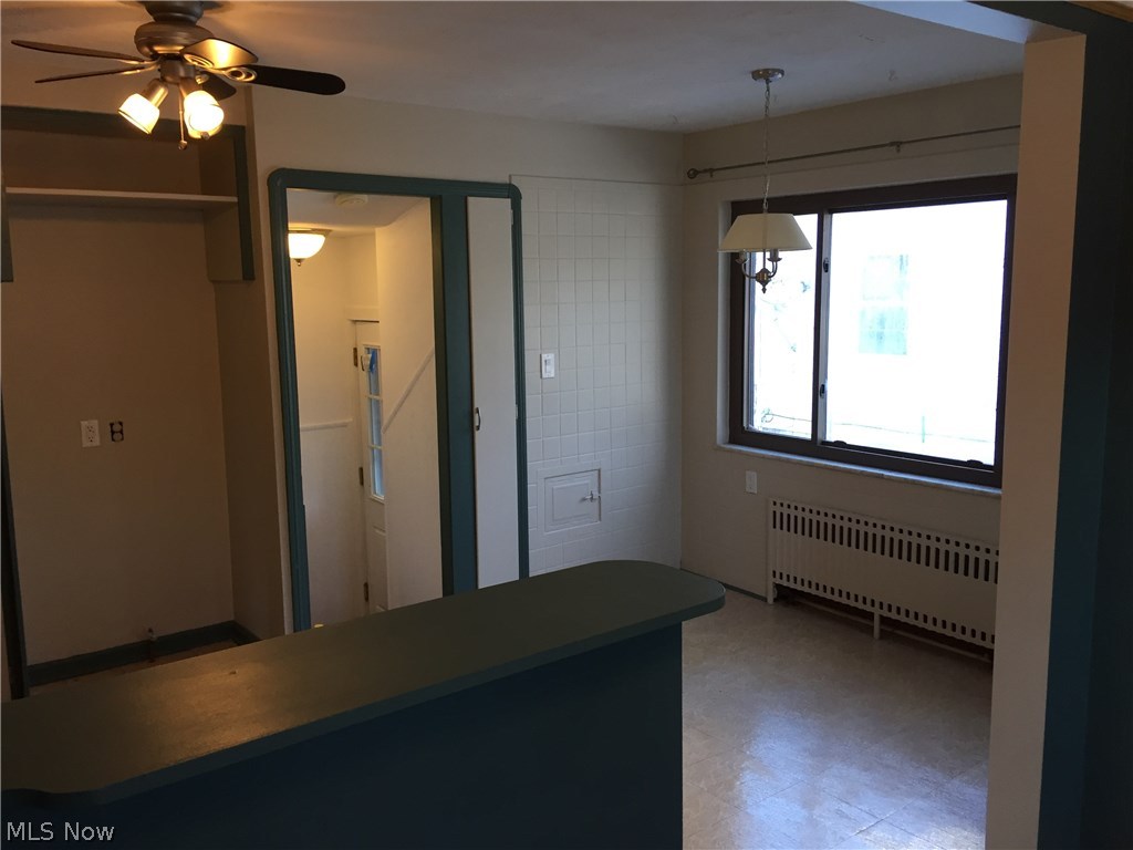 4687 Anderson Road Cleveland, OH 44121 - Photo 11 of 19 Eat in area from dining room, doorway to basement and outside