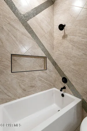 a bathroom with a bathtub