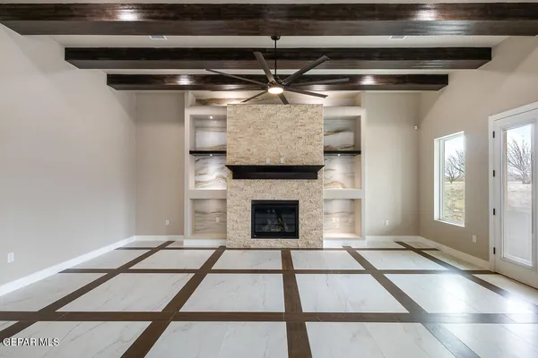 a living room with a fireplace