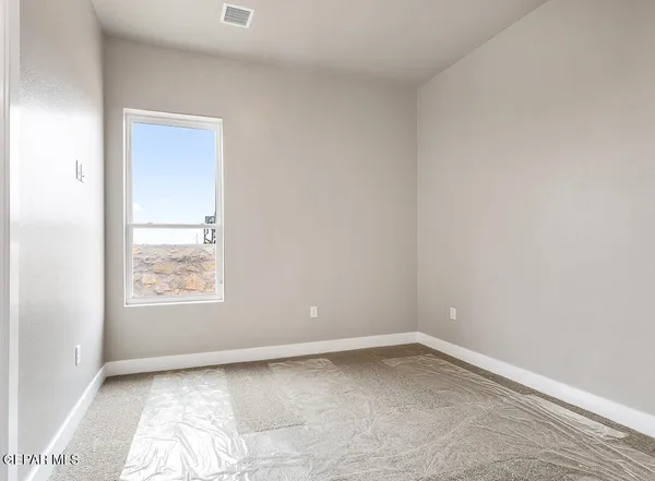 an empty room with a window