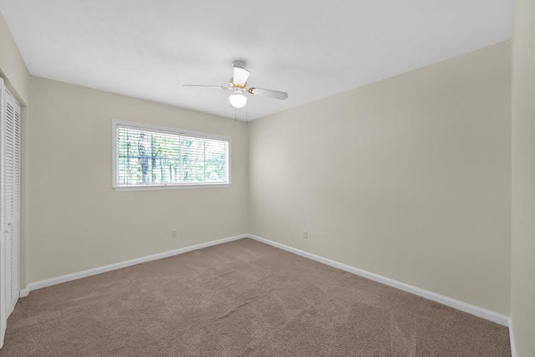 10902 Auger Place Spring, TX 77380 - Photo 14 of 21 an empty room with windows