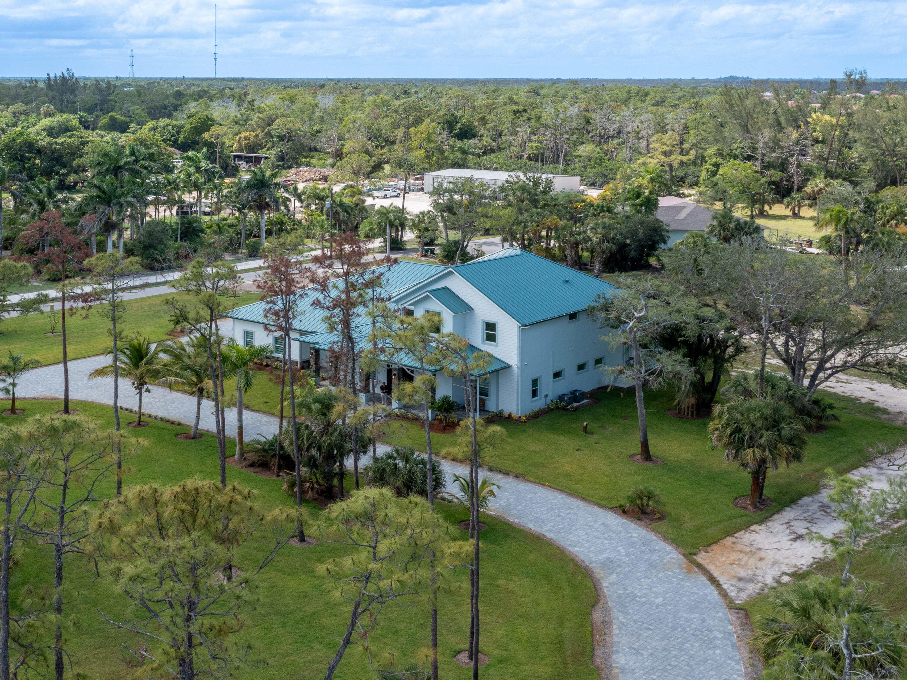 256 Price Street Naples, FL 34113 - Photo 13 of 42 an aerial view of a house with a yard
