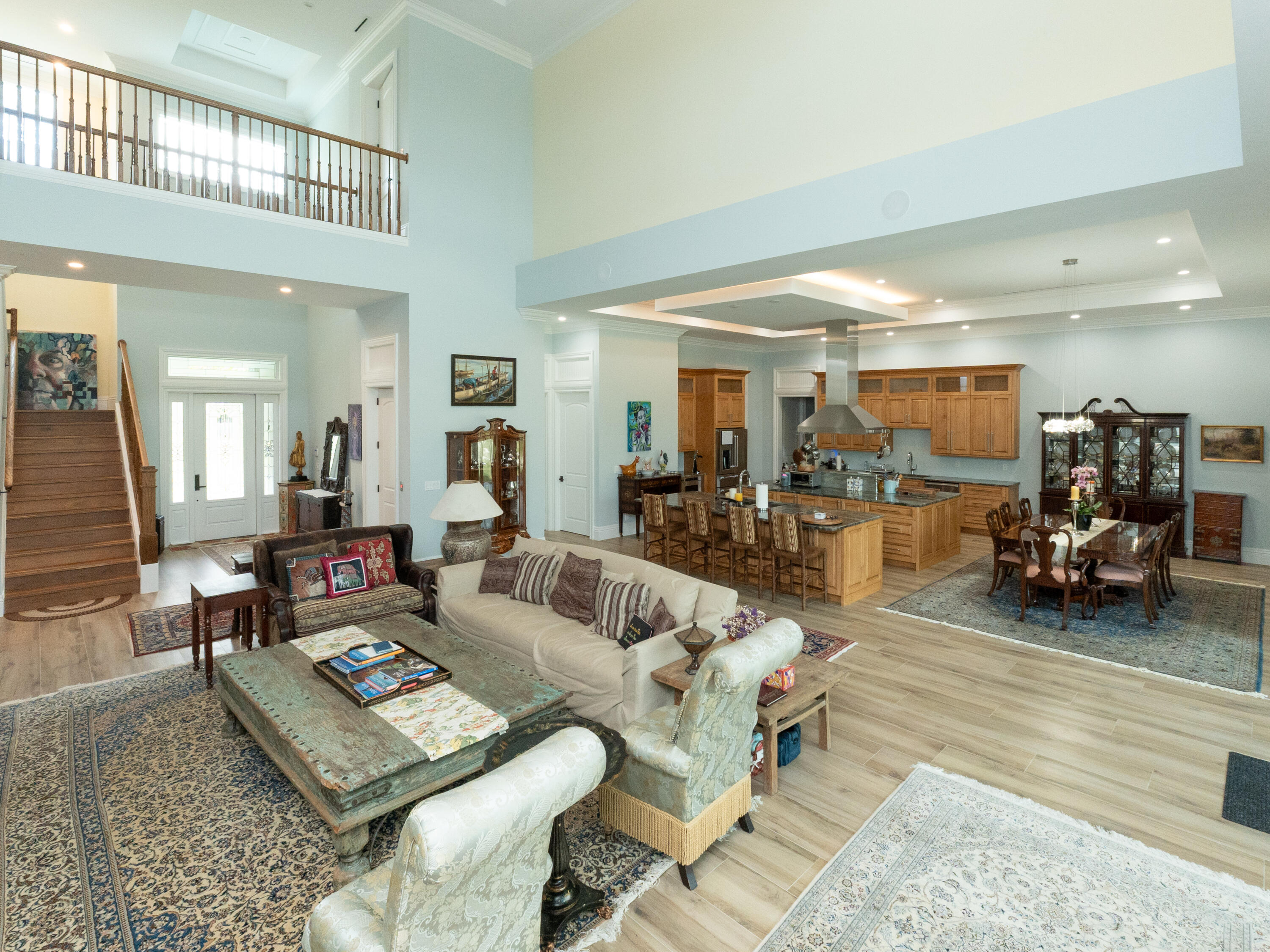 256 Price Street Naples, FL 34113 - Photo 23 of 42 a living room with furniture and a wooden floor