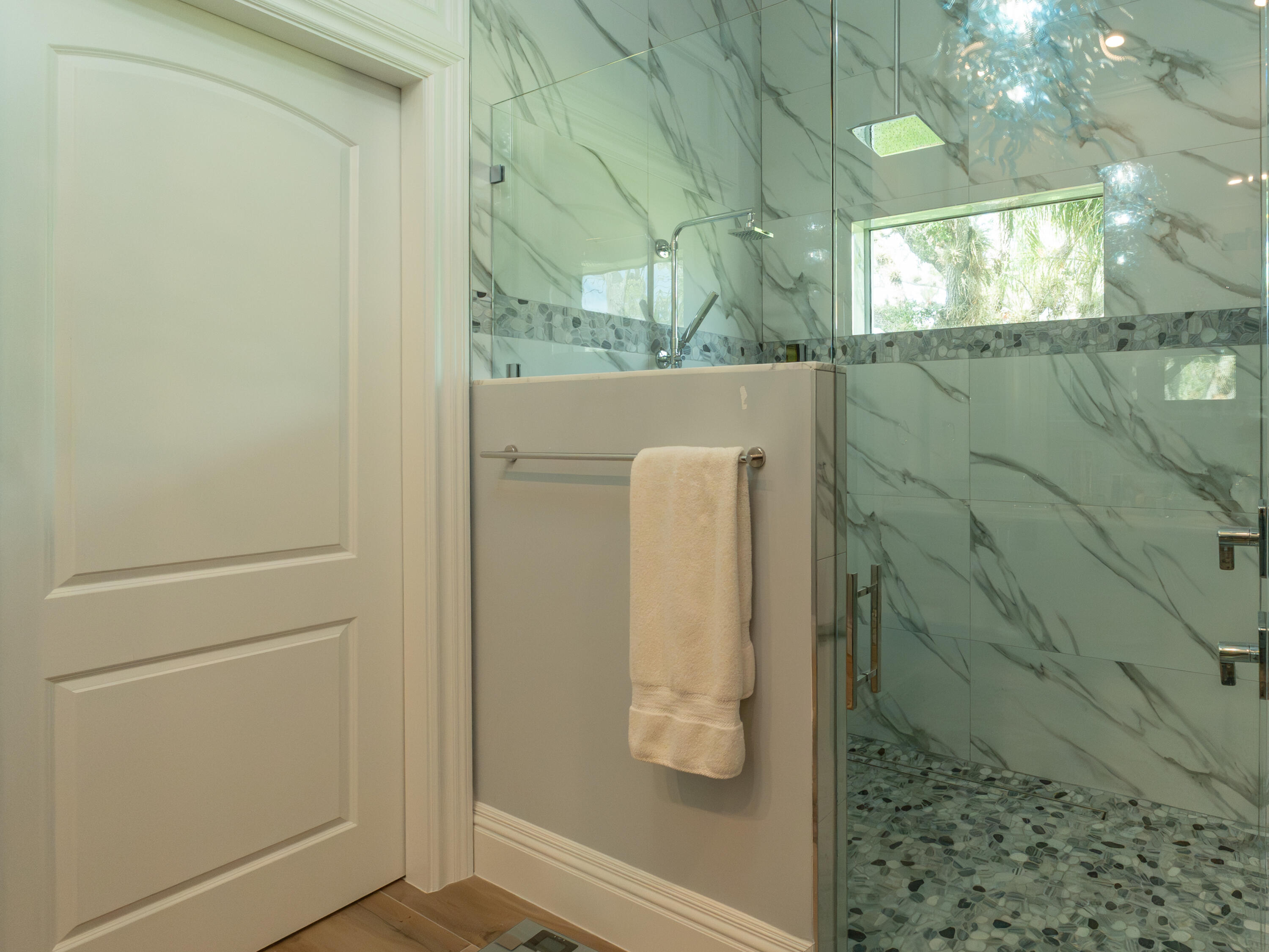 256 Price Street Naples, FL 34113 - Photo 33 of 42 a bathroom with a shower and a mirror