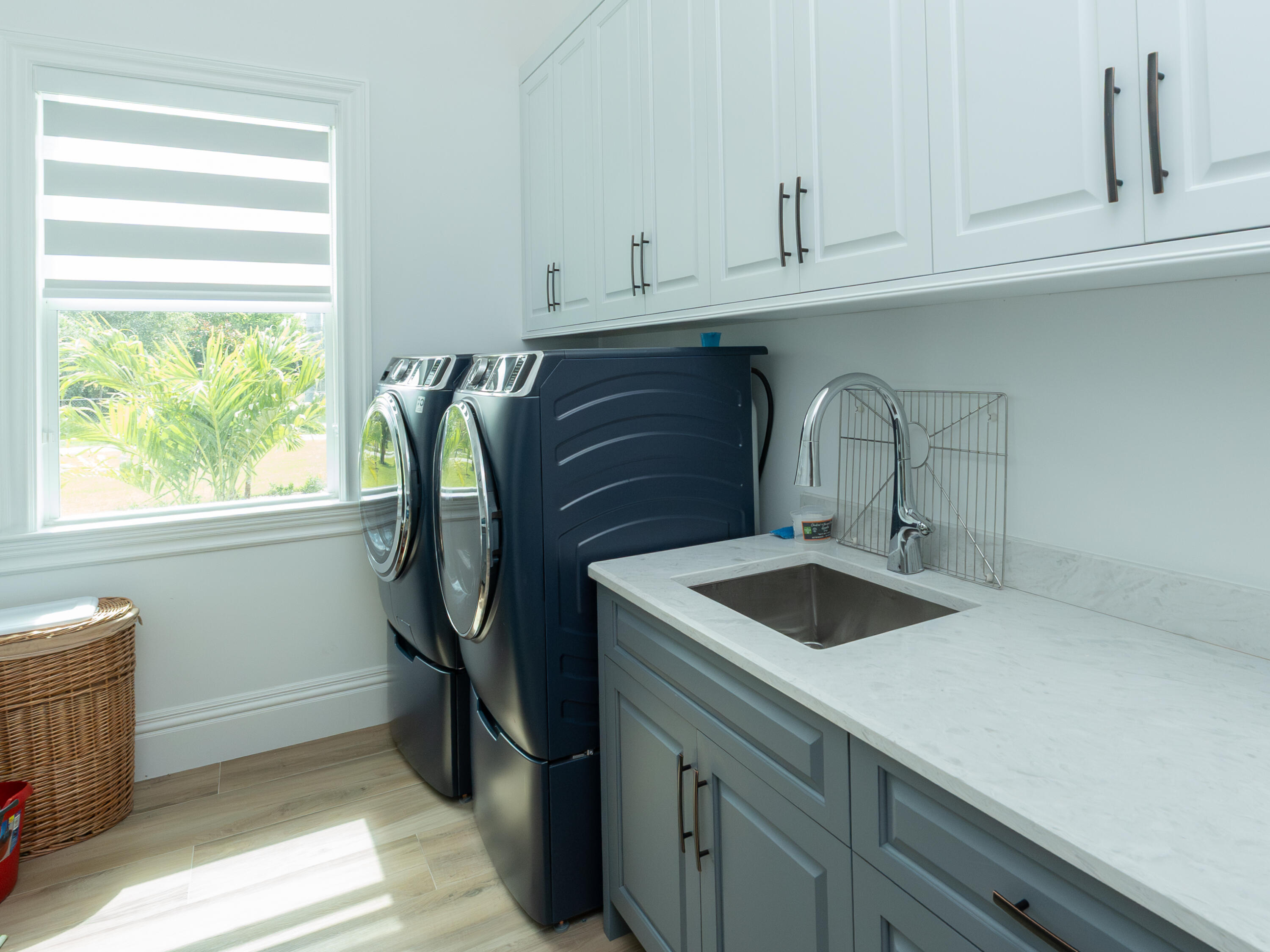 256 Price Street Naples, FL 34113 - Photo 42 of 42 a kitchen with a sink and cabinets