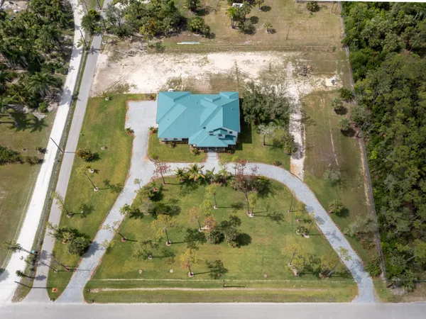 a view of a house with a swimming pool