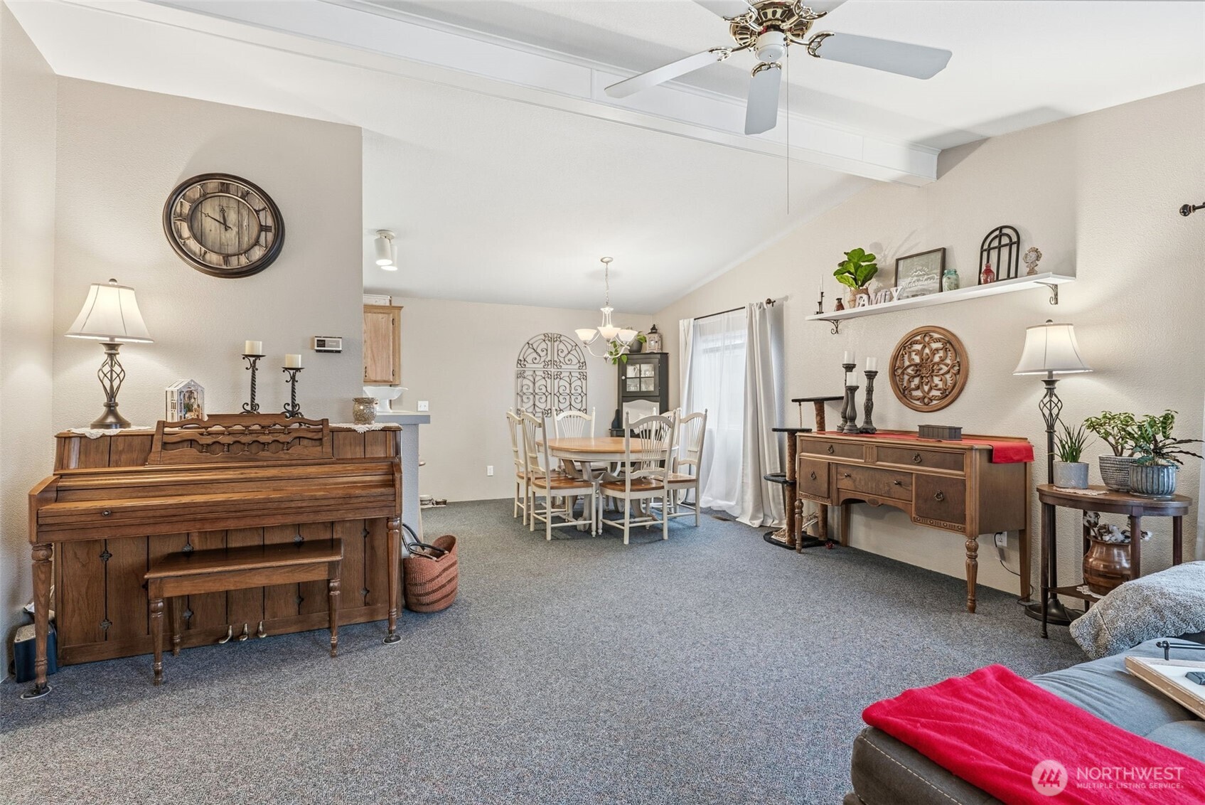129 Arlington Place Longview, WA 98632 - Photo 8 of 27 a bedroom with furniture and a clock