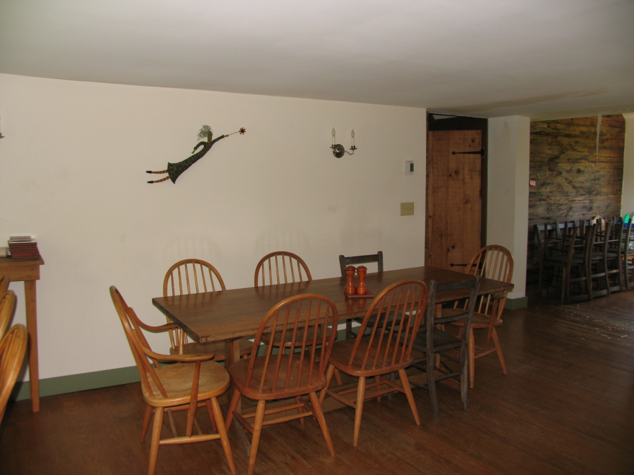470 Ed Jones Road Otis, MA 01253 - Photo 13 of 24 a view of a dining room with furniture and wooden floor