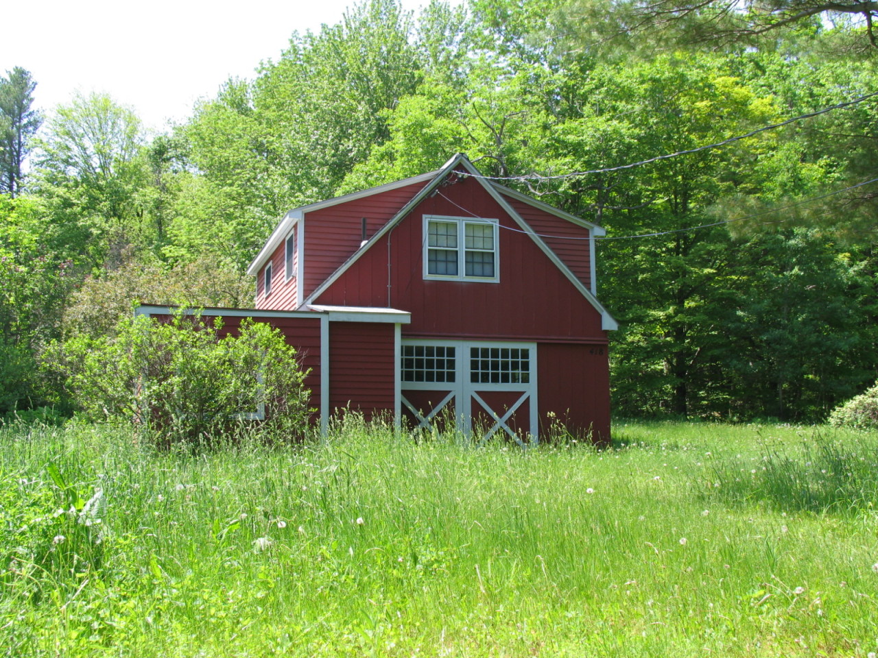 470 Ed Jones Road Otis, MA 01253 - Photo 3 of 24 a view of a house with yard