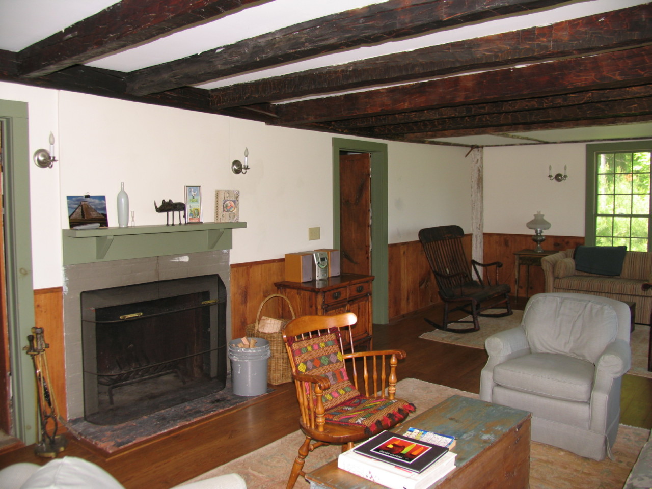 470 Ed Jones Road Otis, MA 01253 - Photo 4 of 24 a living room with furniture and a fireplace