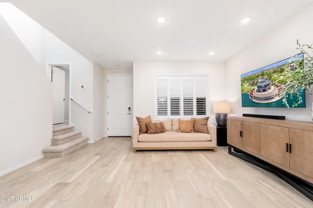 a bedroom with a bed and a fireplace