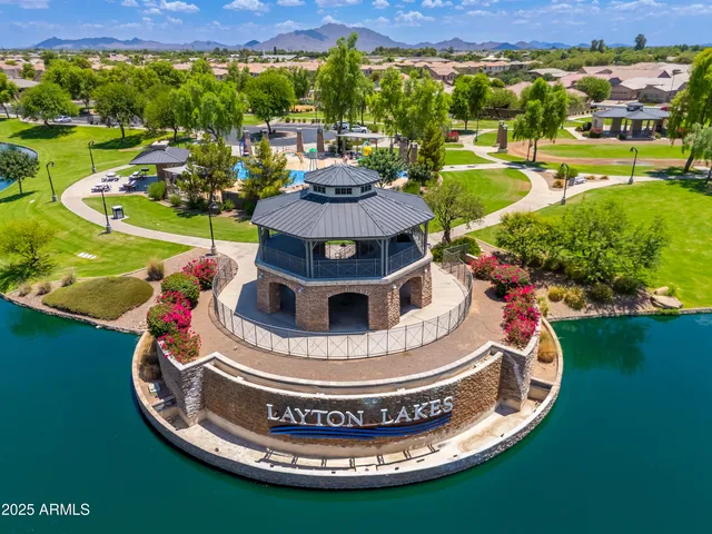 a view of a swimming pool in a garden