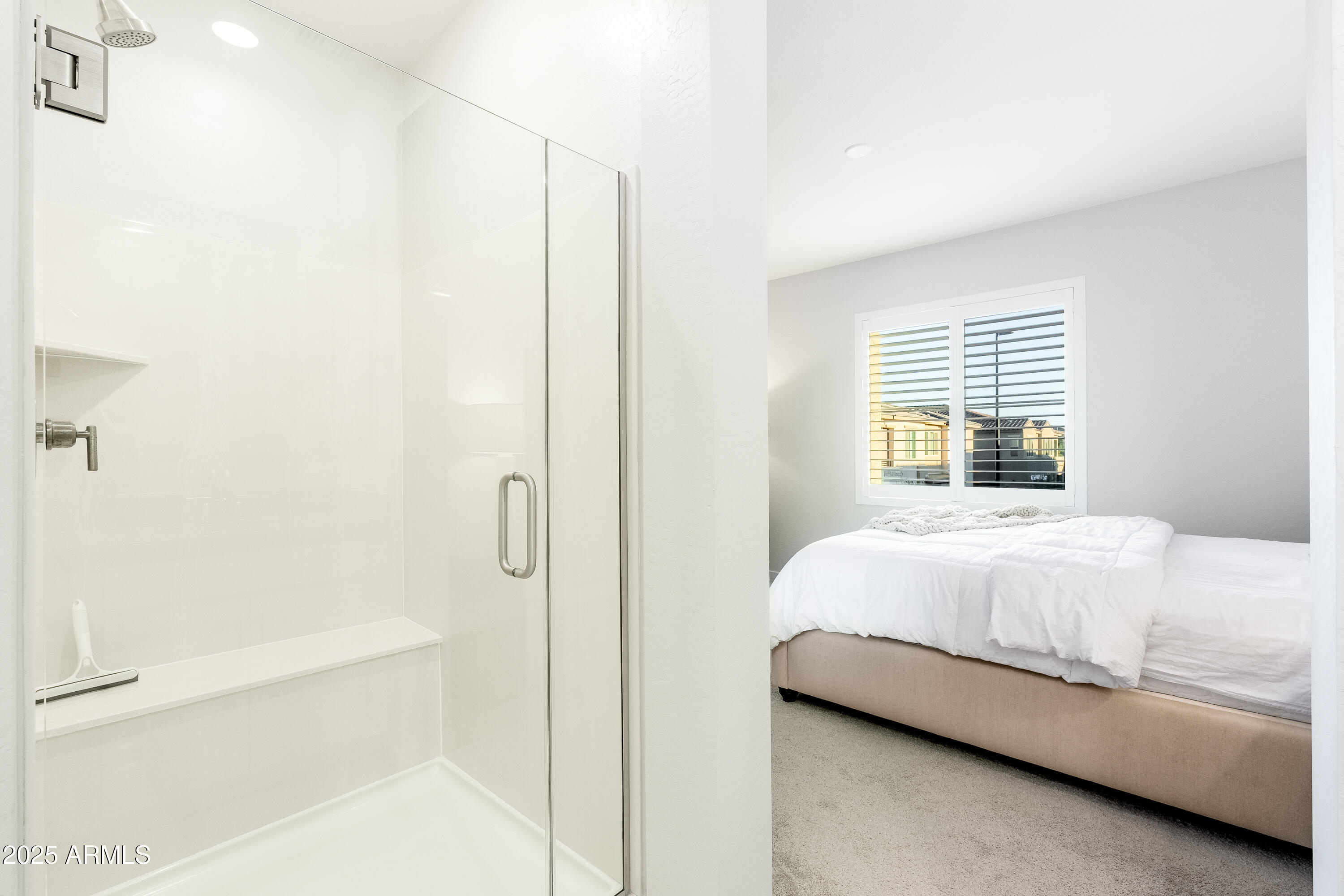 724 East Lark Street, Unit 102 Gilbert, AZ 85297 - Photo 24 of 54 a bedroom with a bed and a window