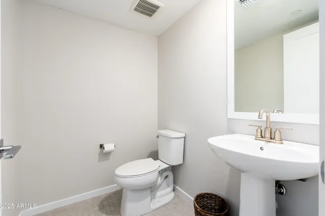 a view of a house with a street