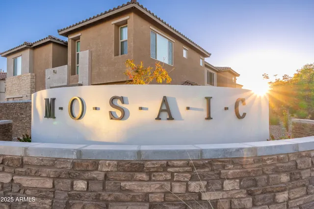 a view of a swimming pool with a yard