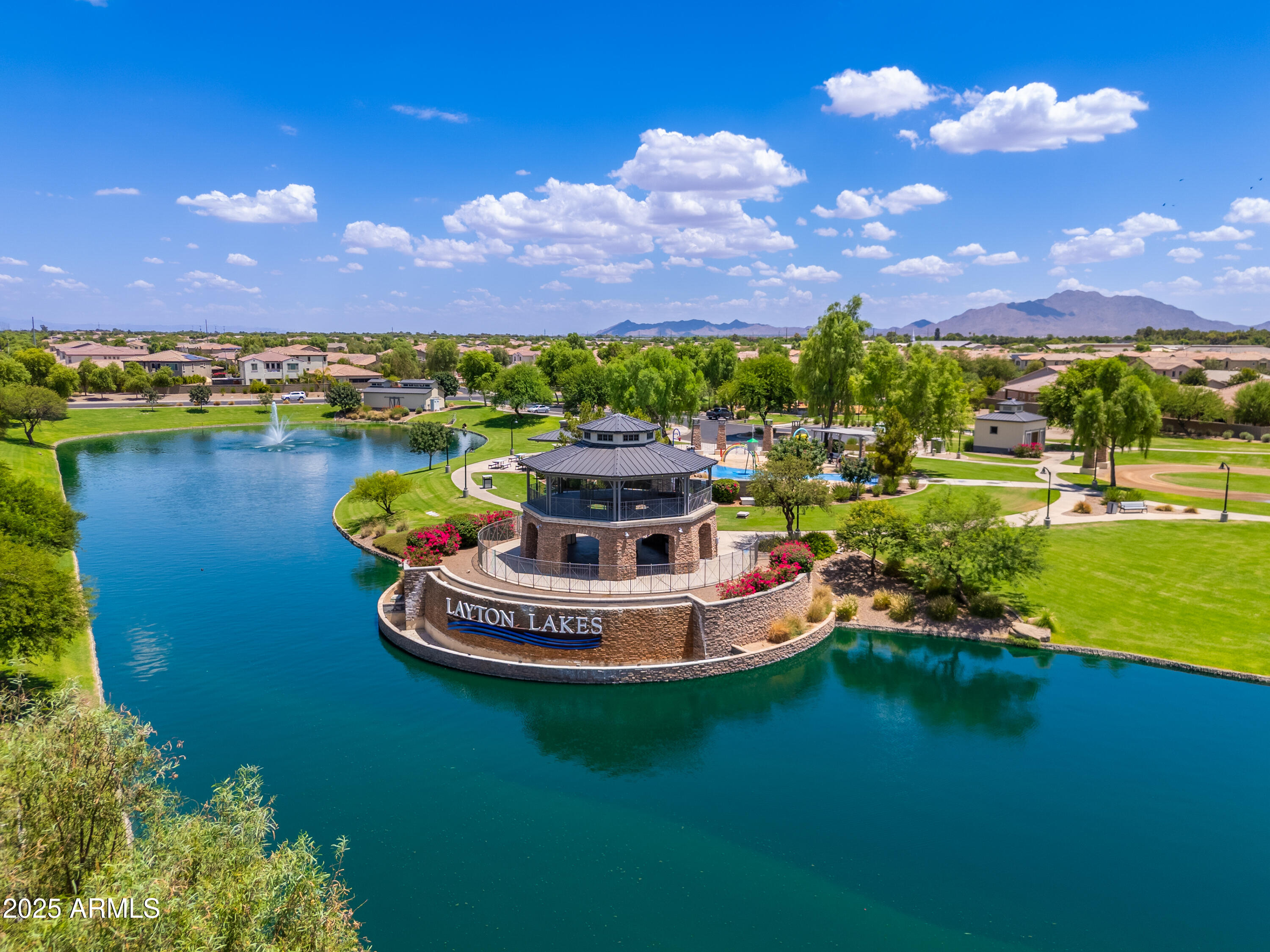 724 East Lark Street, Unit 102 Gilbert, AZ 85297 - Photo 33 of 54 a view of a lake with houses